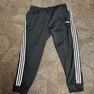 Adidas mens black 2xl jogger pants with pockets and drawstring.  Used few times